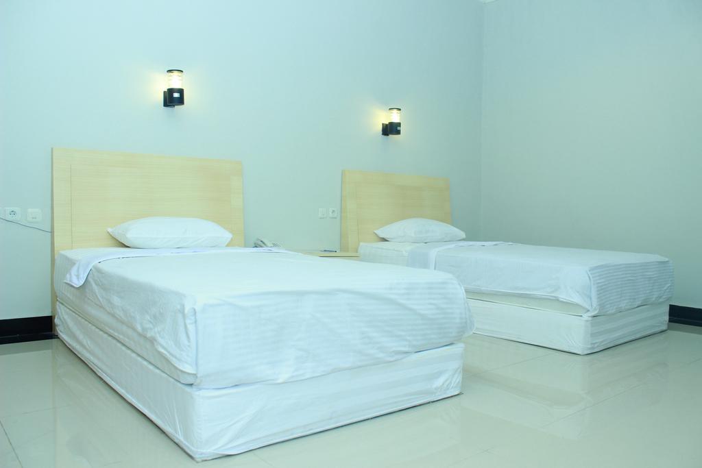 Raja Residence Jambi Джамби Номер фото