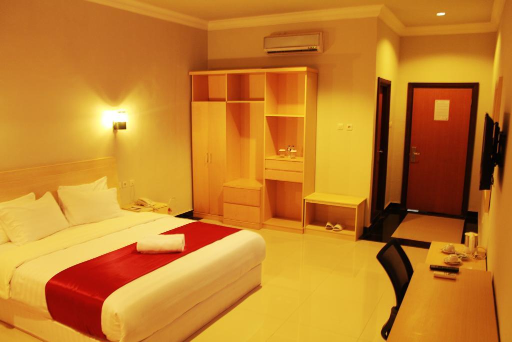 Raja Residence Jambi Джамби Номер фото